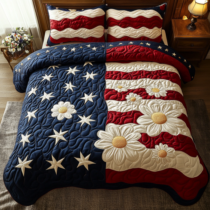 Floral Flag Holiday quilted 3-piece bedding set on a made bed with two matching pillow shams