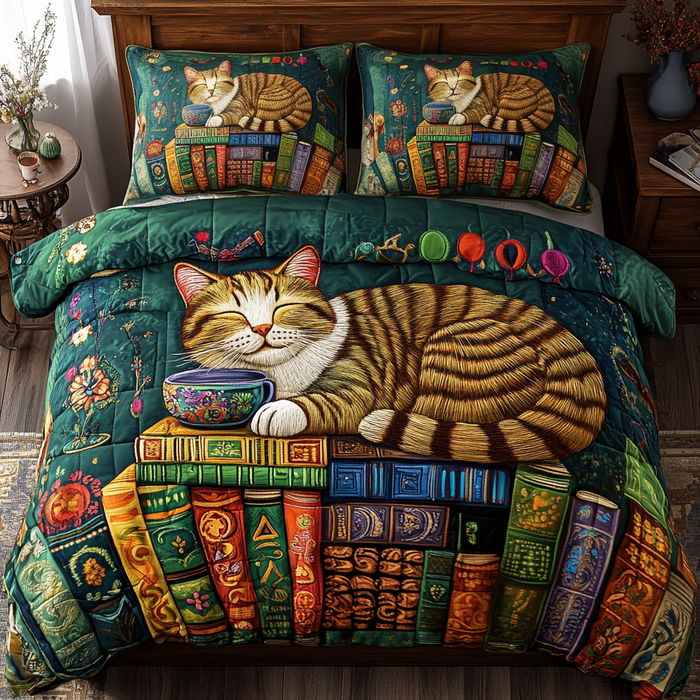 Literary Cat Retreat quilted 3-piece bedding set on a made bed with two matching pillow shams