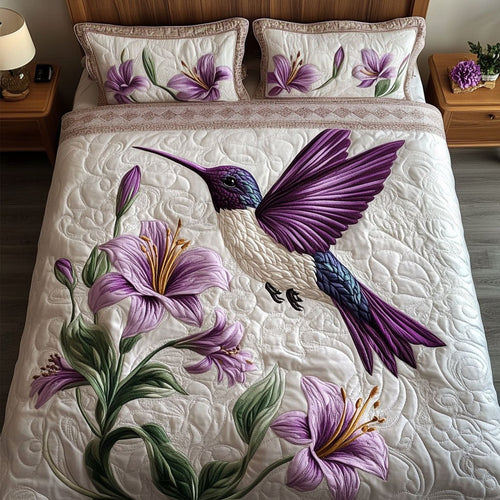 Floral Harmony quilted 3-piece bedding set on a made bed with two matching pillow shams