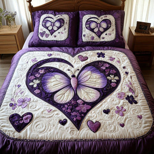 A Love That Blooms quilted 3-piece bedding set on a made bed with two matching pillow shams