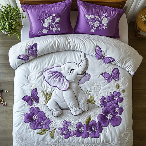 Adorable Elephant Joy quilted 3-piece bedding set on a made bed with two matching pillow shams