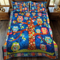 Adorable Owls quilted 3-piece bedding set on a made bed with two matching pillow shams