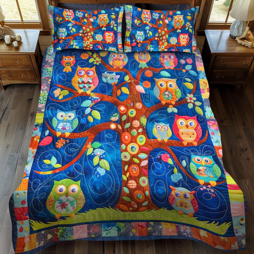 Adorable Owls quilted 3-piece bedding set on a made bed with two matching pillow shams
