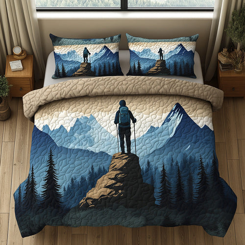 Adventure Ridge quilted 3-piece bedding set on a made bed with two matching pillow shams