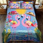 Affectionate Flamingo Animal quilted 3-piece bedding set on a made bed with two matching pillow shams