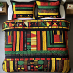 African Vibes quilted 3-piece bedding set on a made bed with two matching pillow shams