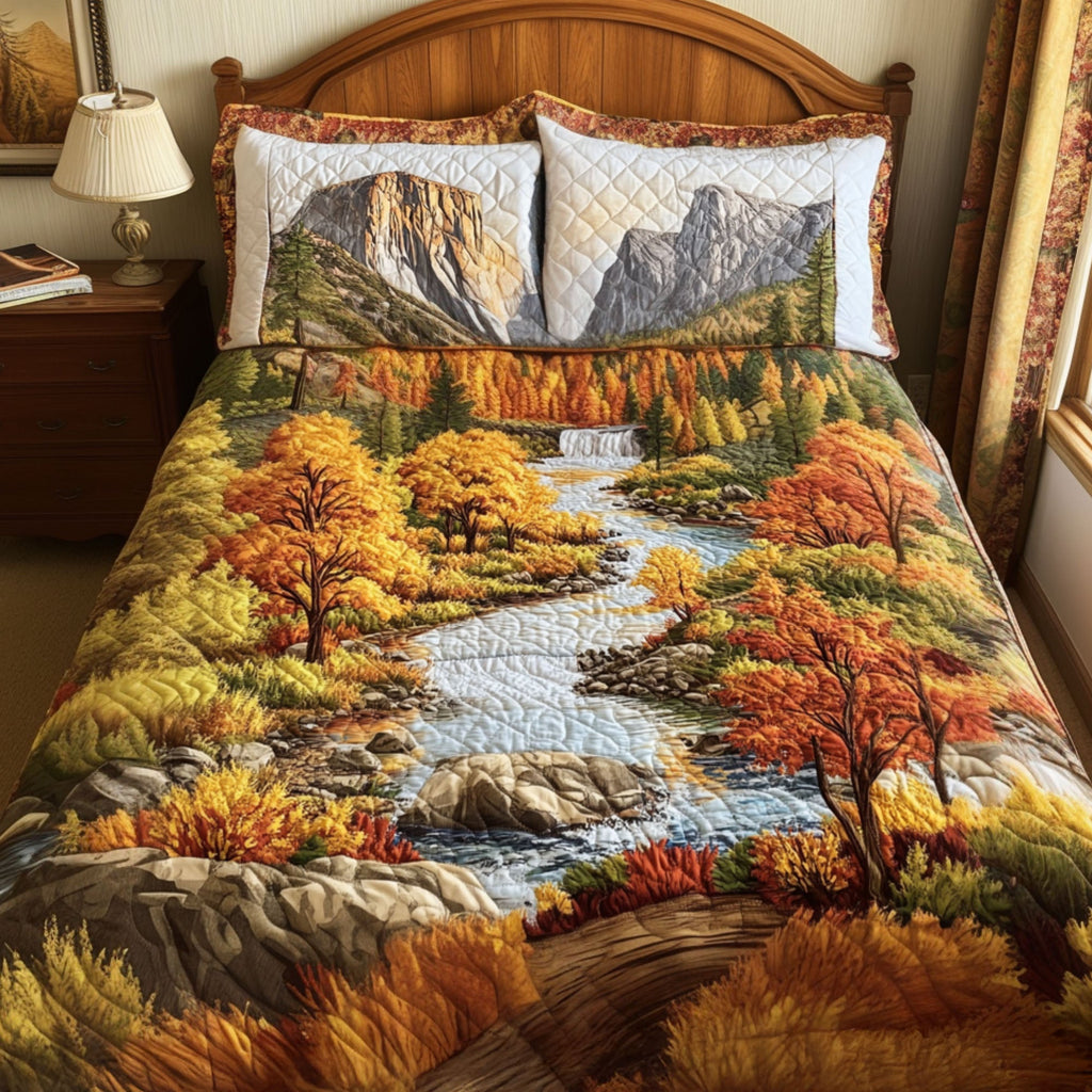 Autumn In Yosemite quilted 3-piece bedding set on a made bed with two matching pillow shams
