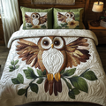 Baby Owl Charm quilted 3-piece bedding set on a made bed with two matching pillow shams