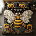 Bee Love quilted 3-piece bedding set on a made bed with two matching pillow shams