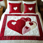 Blissful Hearts Heart quilted 3-piece bedding set on a made bed with two matching pillow shams