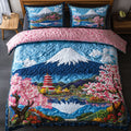 Blossom Haven Fuji quilted 3-piece bedding set on a made bed with two matching pillow shams