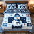 Blue Snowman quilted 3-piece bedding set on a made bed with two matching pillow shams