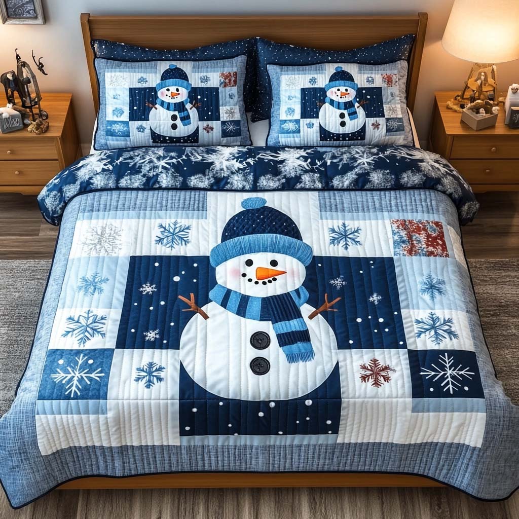 Blue Snowman quilted 3-piece bedding set on a made bed with two matching pillow shams