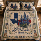 Bluebonnet Bloom quilted 3-piece bedding set on a made bed with two matching pillow shams