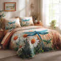 Bluewing Bloom quilted 3-piece bedding set on a made bed with two matching pillow shams
