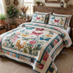 Butterfly Blossom Charm quilted 3-piece bedding set on a made bed with two matching pillow shams