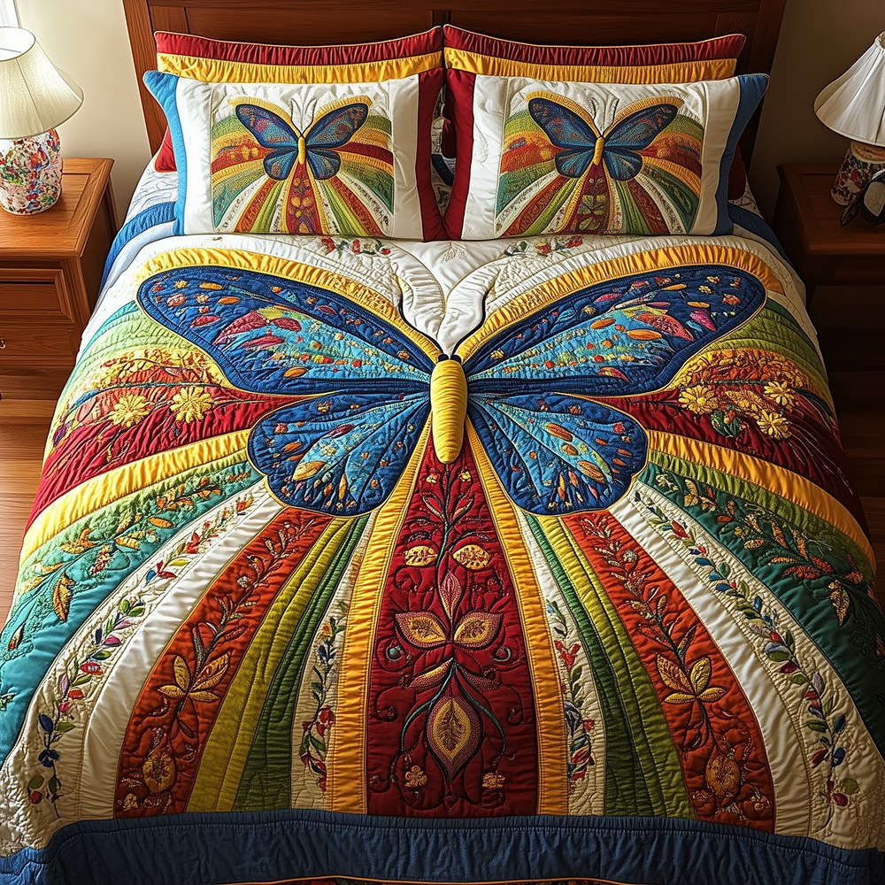 Butterfly Charm quilted 3-piece bedding set on a made bed with two matching pillow shams