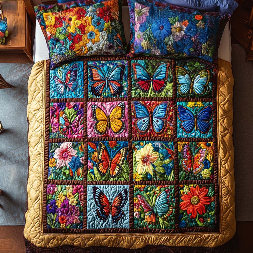 Butterfly Garden Whispers quilted 3-piece bedding set on a made bed with two matching pillow shams
