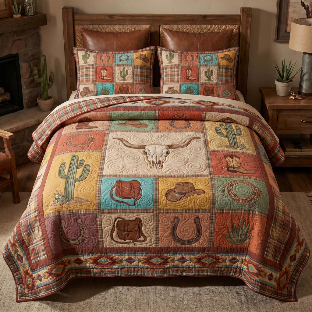 Cactus Bloom Homestead quilted 3-piece bedding set on a made bed with two matching pillow shams