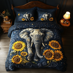 Charcoal Elephant Dream quilted 3-piece bedding set on a made bed with two matching pillow shams