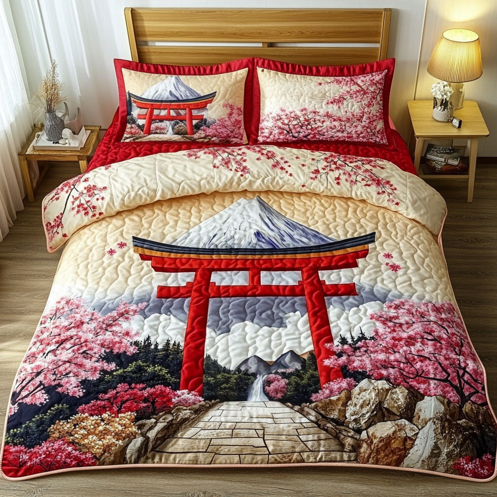 Cherry Blossom Shrine Fuji quilted 3-piece bedding set on a made bed with two matching pillow shams