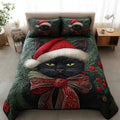 Christmas Black Cat quilted 3-piece bedding set on a made bed with two matching pillow shams