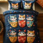 Chubby Mug Kitties quilted 3-piece bedding set on a made bed with two matching pillow shams