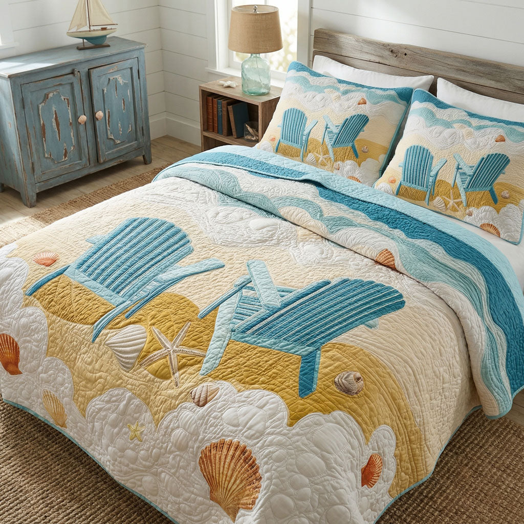 Coastal Calm Beach quilted 3-piece bedding set on a made bed with two matching pillow shams