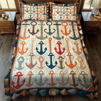 Colorful Anchors quilted 3-piece bedding set on a made bed with two matching pillow shams