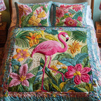 Coral Dancer quilted 3-piece bedding set on a made bed with two matching pillow shams