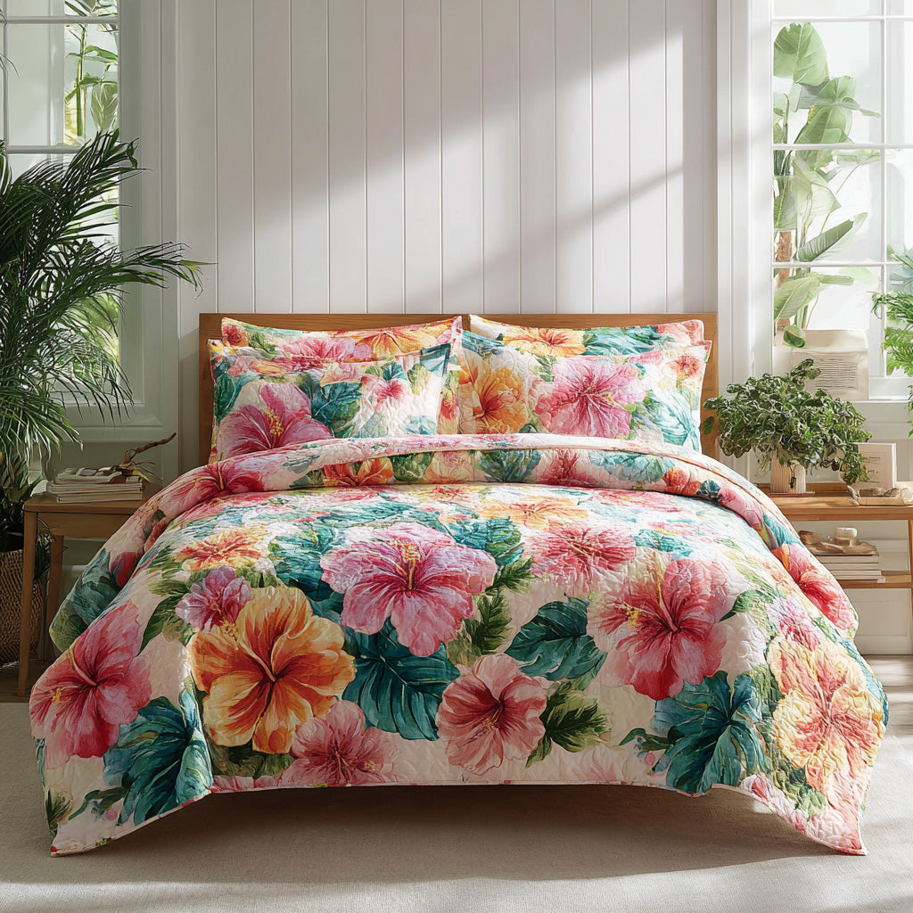 Coral Reef Aloha quilted 3-piece bedding set on a made bed with two matching pillow shams