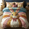 Cotton Tail quilted 3-piece bedding set on a made bed with two matching pillow shams