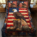 Courage Woven quilted 3-piece bedding set on a made bed with two matching pillow shams
