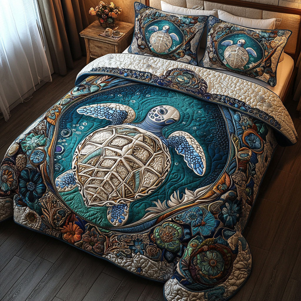 Deep Blue Escape quilted 3-piece bedding set on a made bed with two matching pillow shams