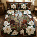 Delta Charm quilted 3-piece bedding set on a made bed with two matching pillow shams