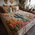 Desert Bloom Prickly Pear quilted 3-piece bedding set on a made bed with two matching pillow shams