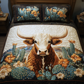 Desert Longhorn quilted 3-piece bedding set on a made bed with two matching pillow shams