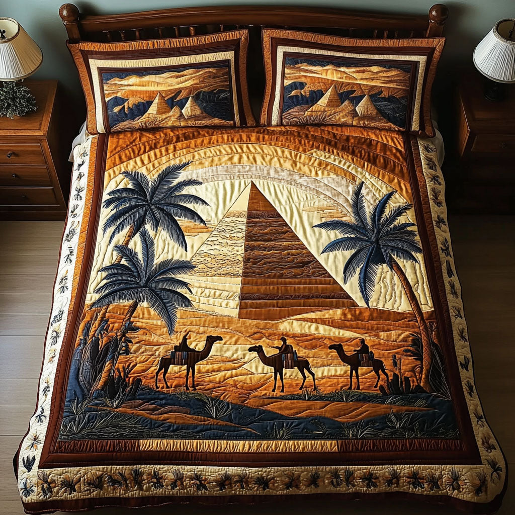 Desert Pyramid Dream quilted 3-piece bedding set on a made bed with two matching pillow shams