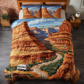Desert Trail Arizona quilted 3-piece bedding set on a made bed with two matching pillow shams