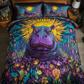 Dream Beast quilted 3-piece bedding set on a made bed with two matching pillow shams