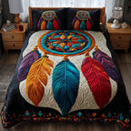 Dreamcatcher Bloom quilted 3-piece bedding set on a made bed with two matching pillow shams