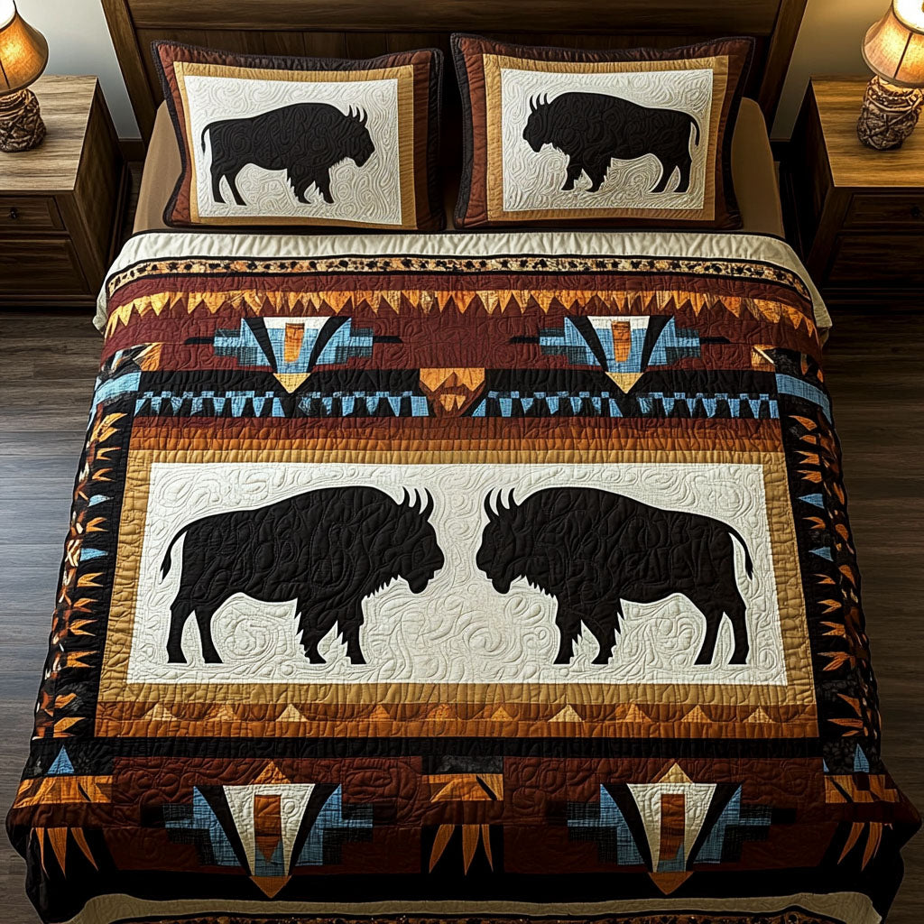 Dusty Prairie quilted 3-piece bedding set on a made bed with two matching pillow shams