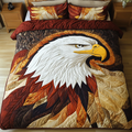 Eagle Glory Bird quilted 3-piece bedding set on a made bed with two matching pillow shams