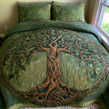 Emerald Tree Of Life quilted 3-piece bedding set on a made bed with two matching pillow shams