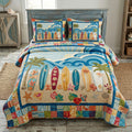 Endless Summer Surf quilted 3-piece bedding set on a made bed with two matching pillow shams
