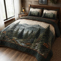 Evergreen Valley quilted 3-piece bedding set on a made bed with two matching pillow shams
