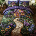 Fairytale Cottage quilted 3-piece bedding set on a made bed with two matching pillow shams