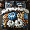 Fall Pumpkin Glow quilted 3-piece bedding set on a made bed with two matching pillow shams