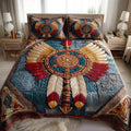 Feathered Dream quilted 3-piece bedding set on a made bed with two matching pillow shams