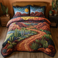 Firelit Valleys quilted 3-piece bedding set on a made bed with two matching pillow shams